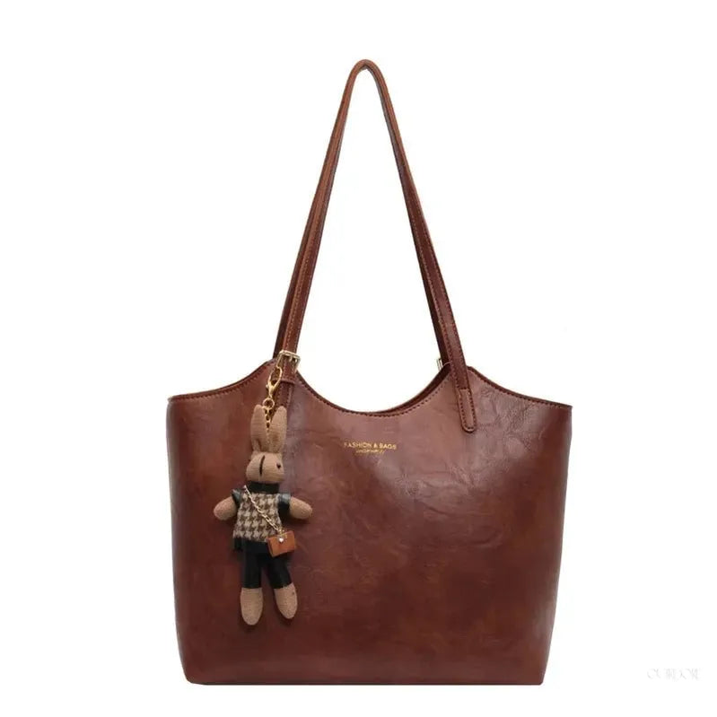Chic Leather Tote Bag with Playful Charm – Elegance Meets Fun