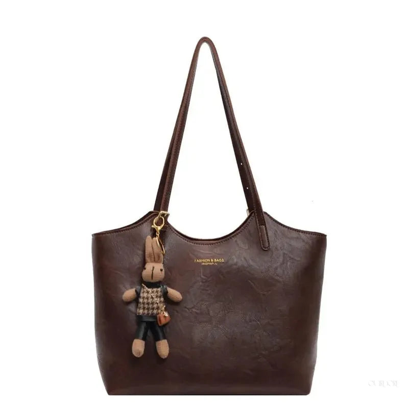Chic Leather Tote Bag with Playful Charm – Elegance Meets Fun