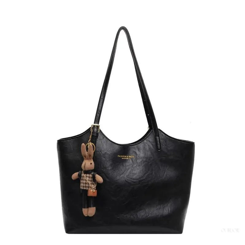 Chic Leather Tote Bag with Playful Charm – Elegance Meets Fun