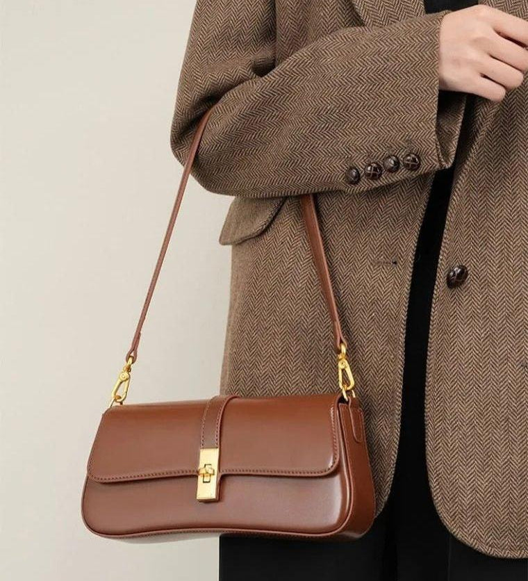 Elegant Baguette Handbag with Gold Lock Closure