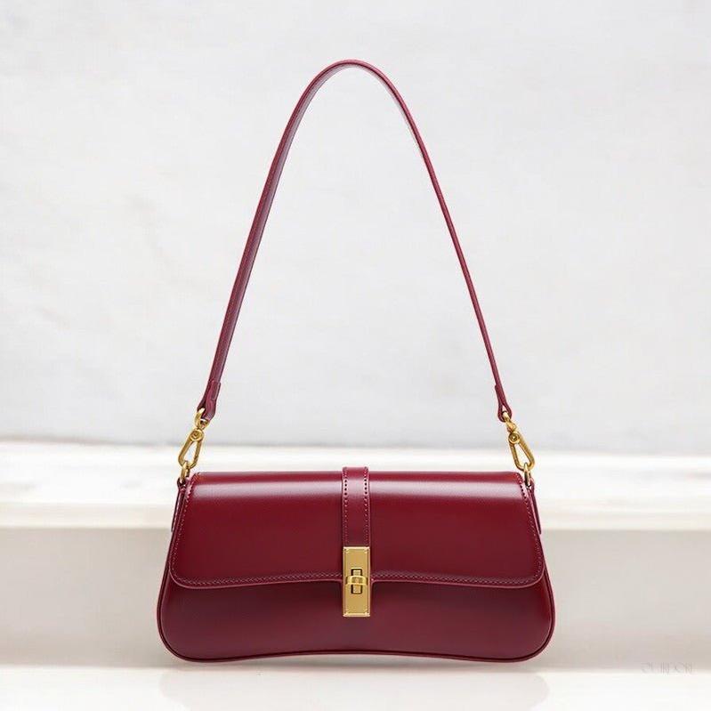Elegant Baguette Handbag with Gold Lock Closure